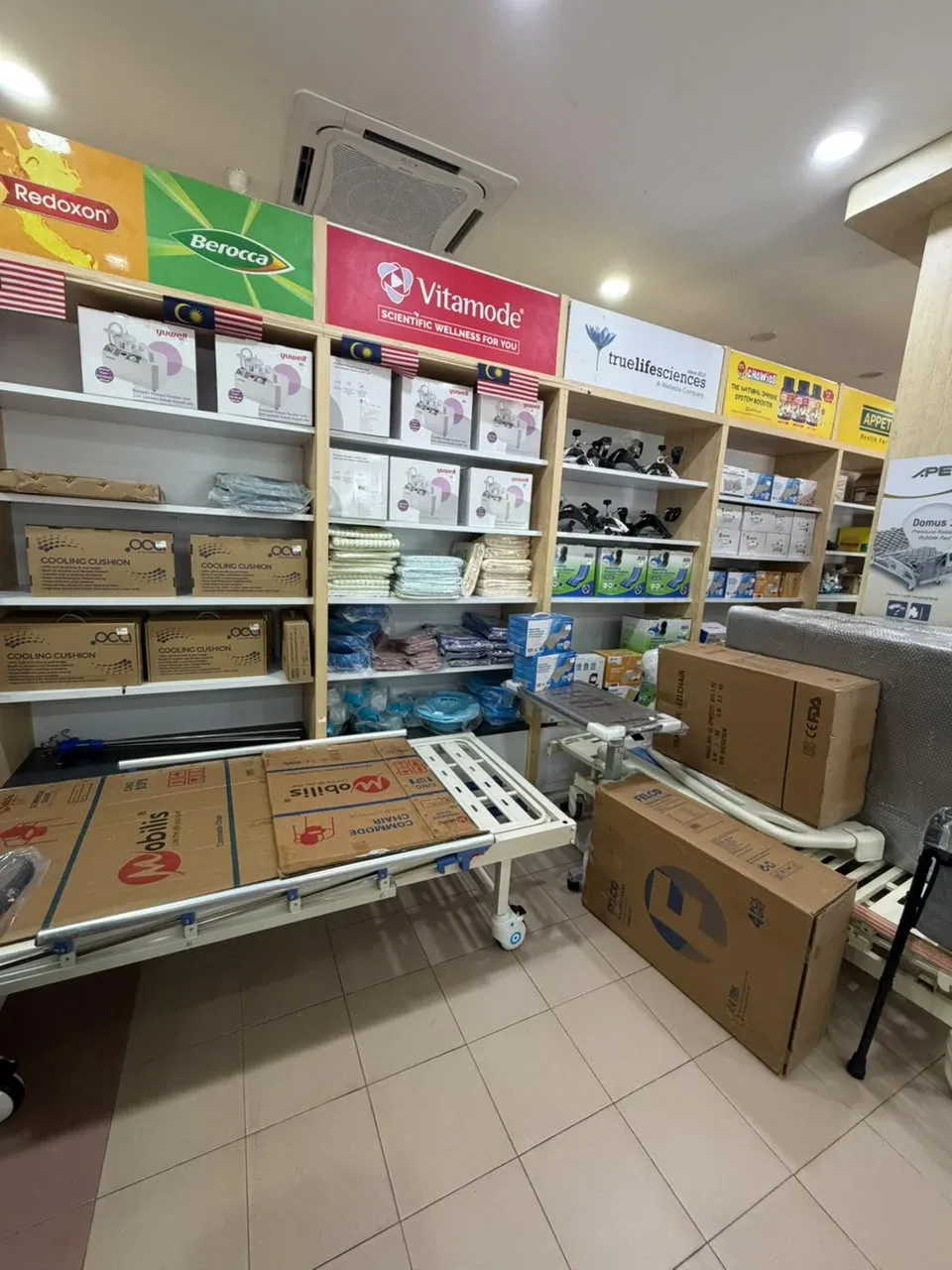 Hospital beds and medical supplies at Farmasi Limbongan HQ